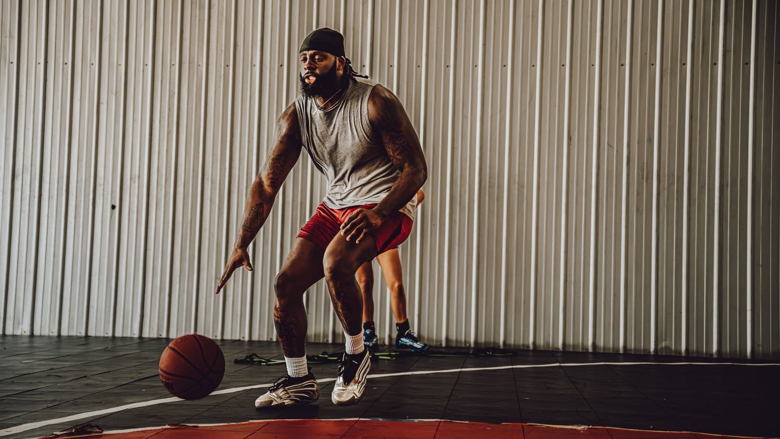 Coach Dyron "Black" Anderson working out in the gym